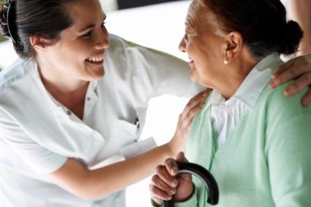 Nurse and elderly lady patient